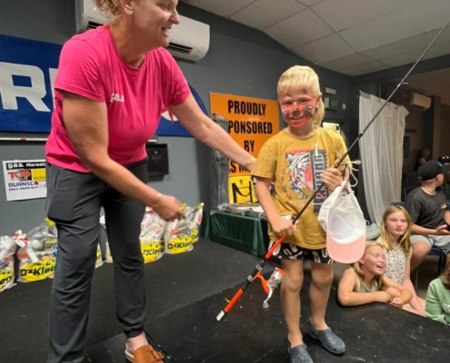 Liz presenting at the fishing competition